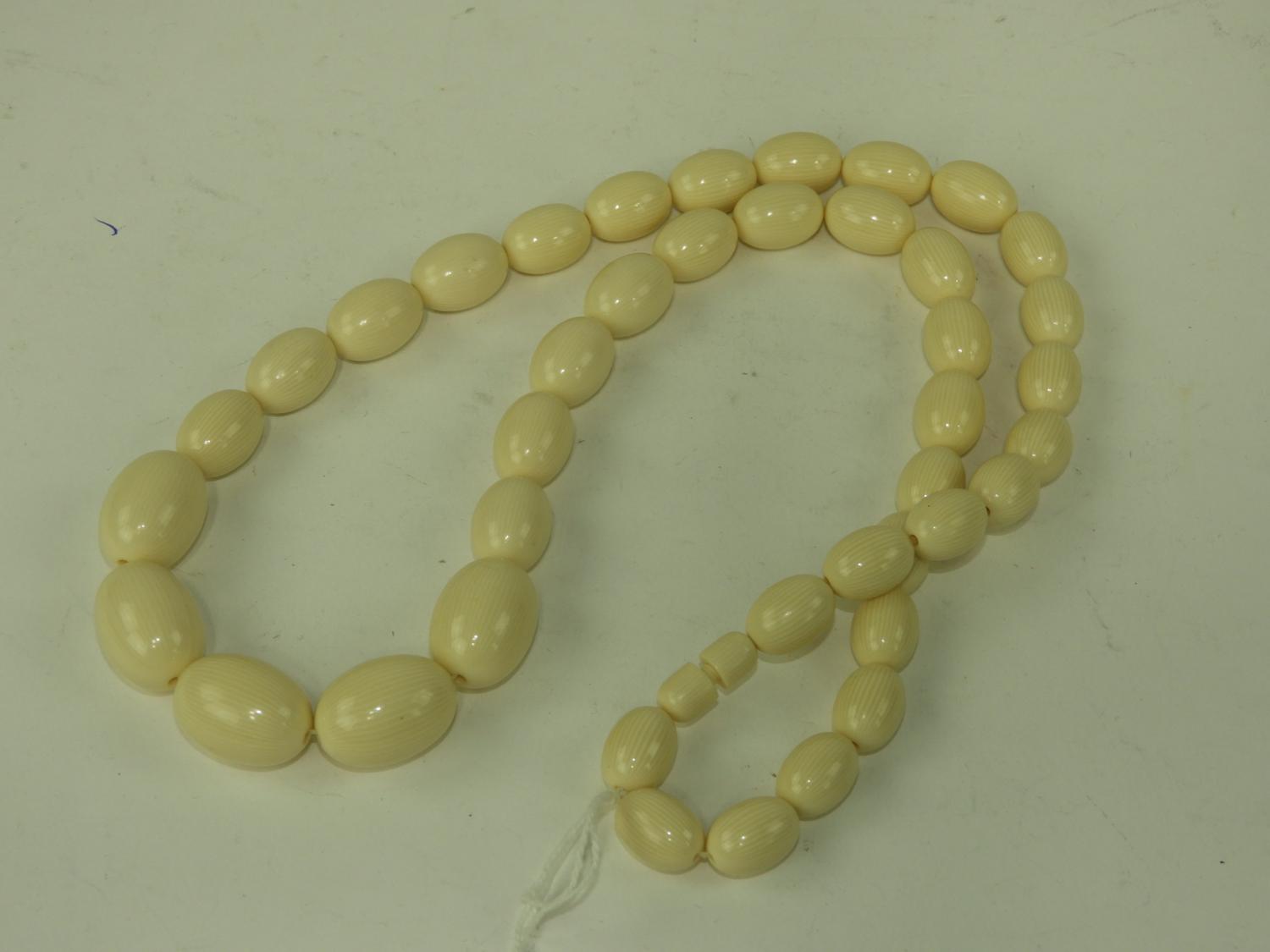 Murrays Auctioneers Lot 72 Graduated french ivory beaded necklace