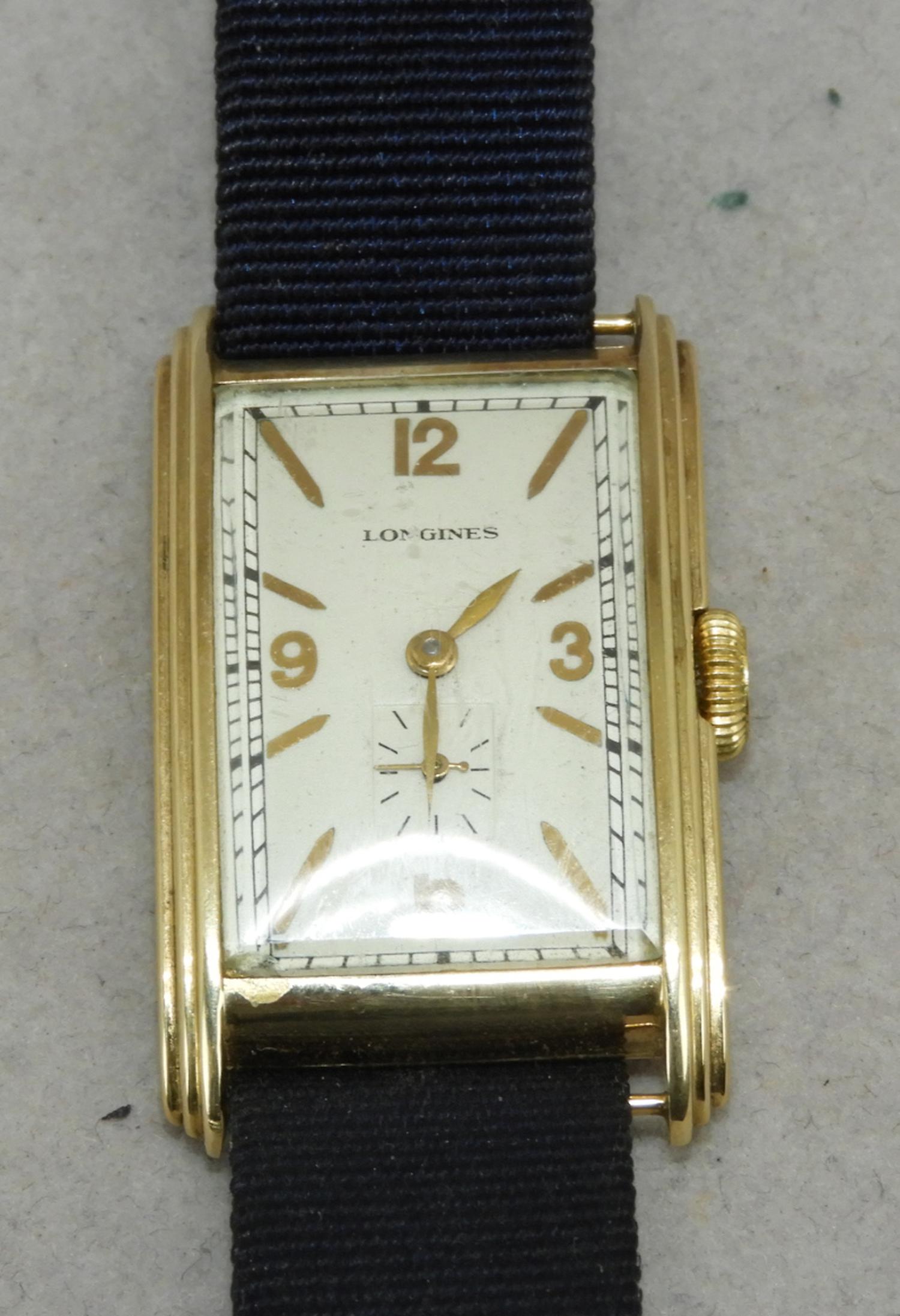 Murrays Auctioneers - Lot 25b: Gents 14K gold Longines tank watch ...