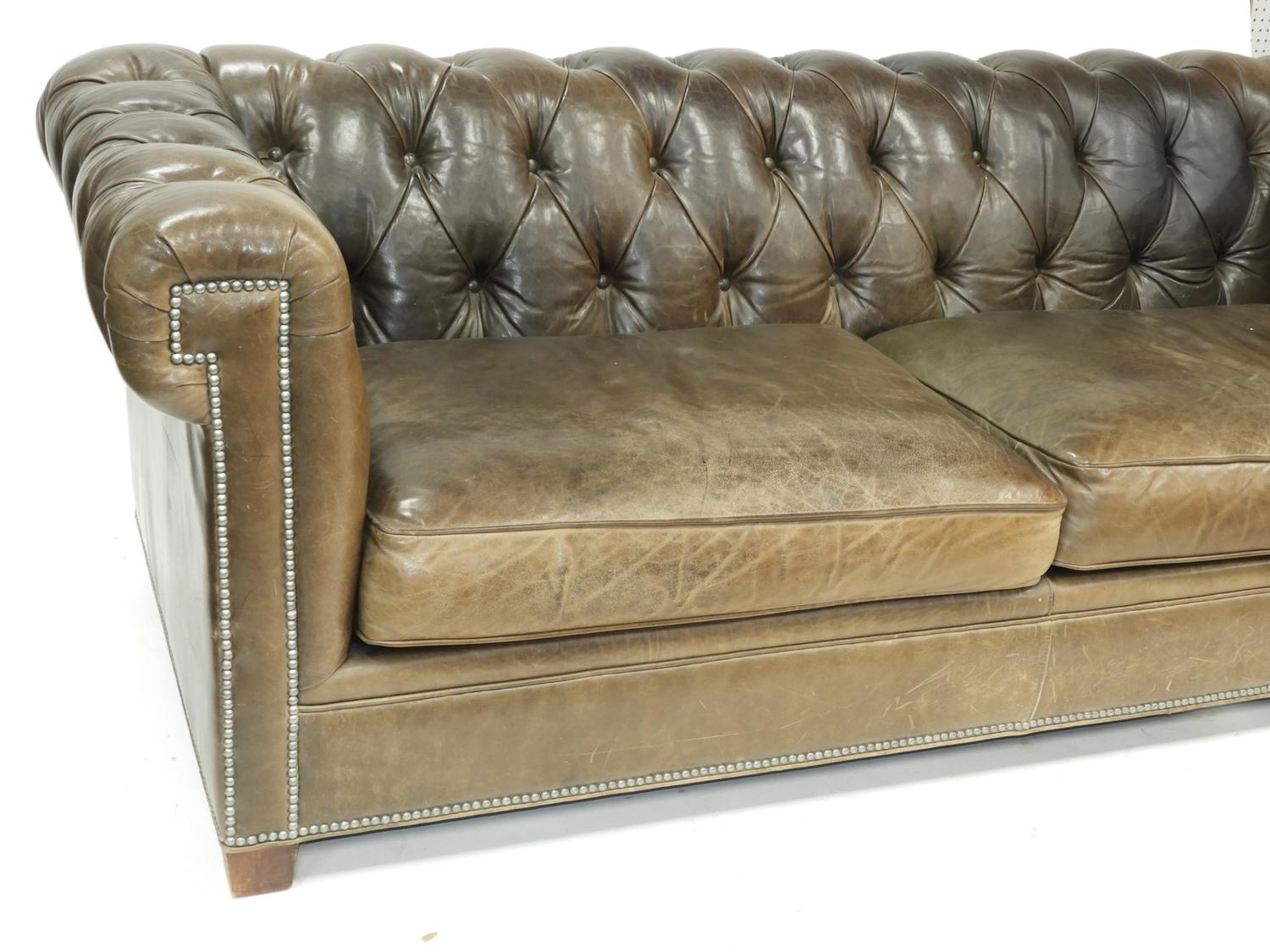button tuck leather sofa